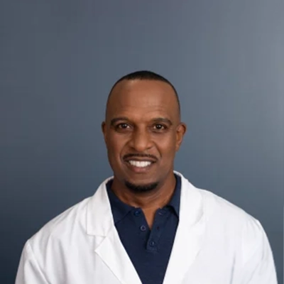 Walter Scott Metcalfe Smiling In Lab Coat